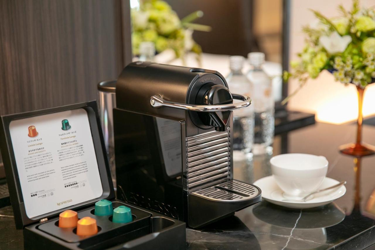 Nagoya Tokyu Hotel Exterior foto A Nespresso coffee machine